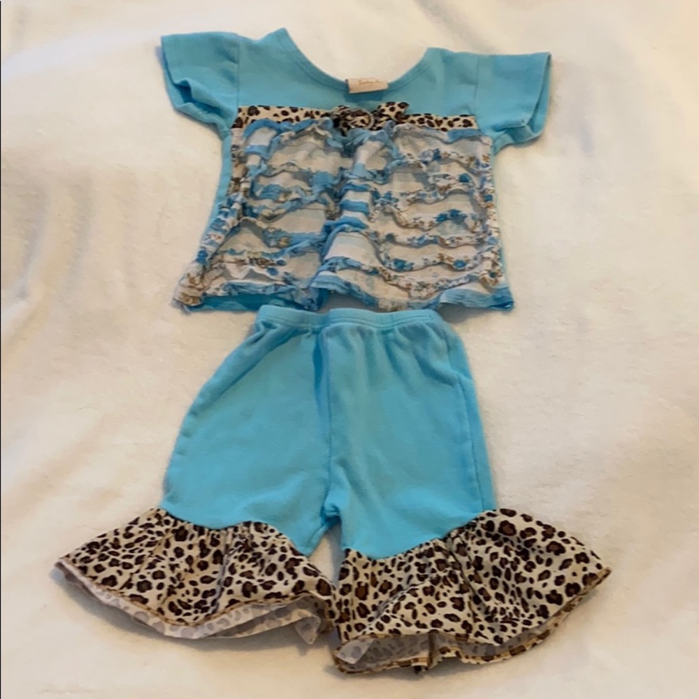 Teal and leopard outfit